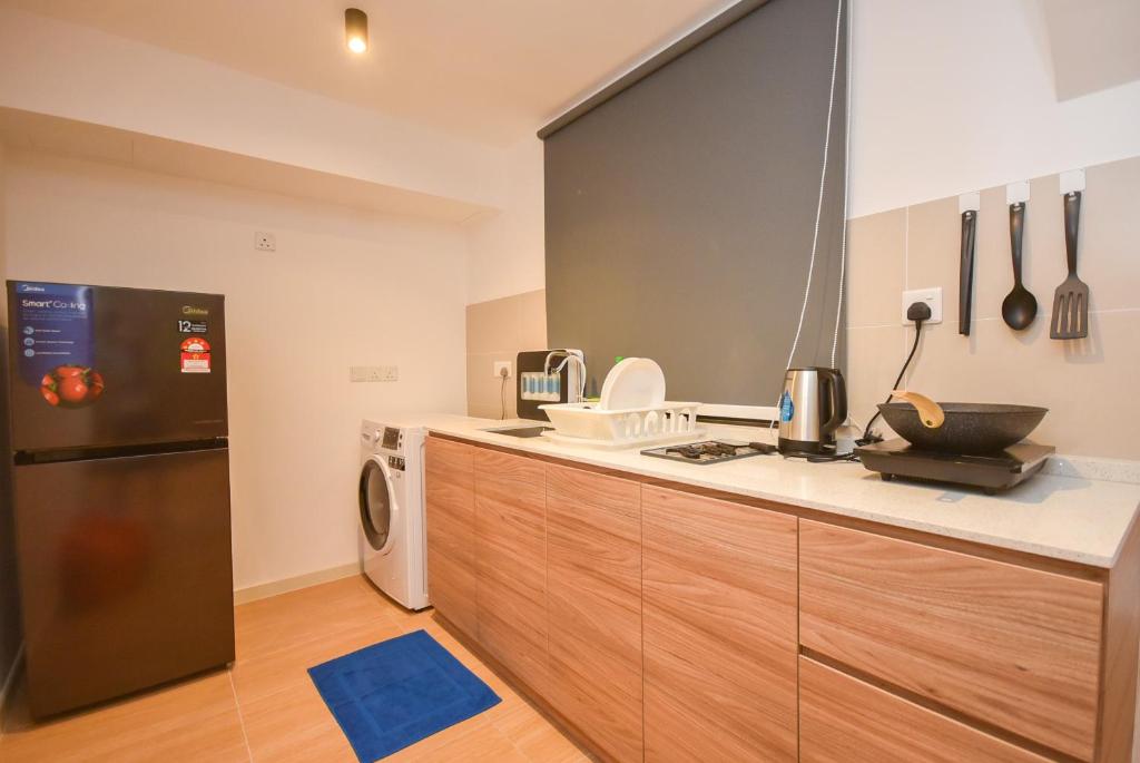 Kuchyň nebo kuchyňský kout v ubytování Sunway Grid Loft Suite by Nest Home【Olympic Size Pool】