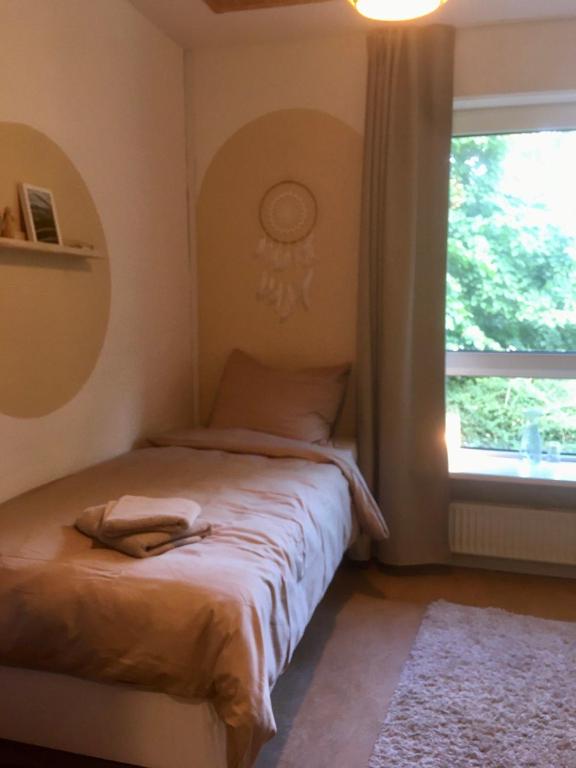 Postel nebo postele na pokoji v ubytování Hollys Bed & Breakfast