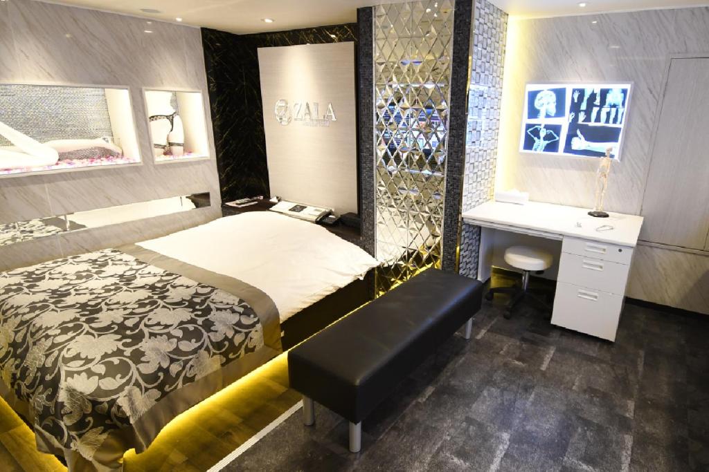 Postel nebo postele na pokoji v ubytování Hotel ZALA