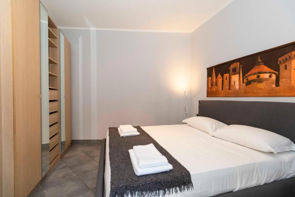 Voodi või voodid majutusasutuse Miglietti Apt a few steps from Piazza Statuto! toas