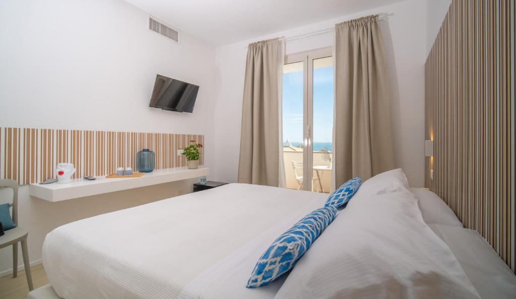 Postel nebo postele na pokoji v ubytování Mia Hotel Numana