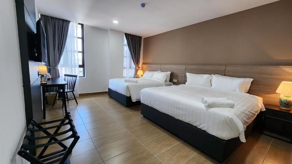 Postel nebo postele na pokoji v ubytování Yu Hotel Chinatown