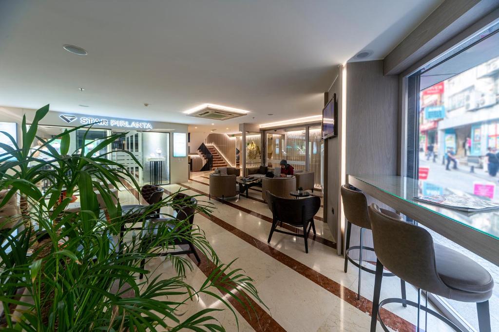 A seating area at Aprilis Hotel - Special Category