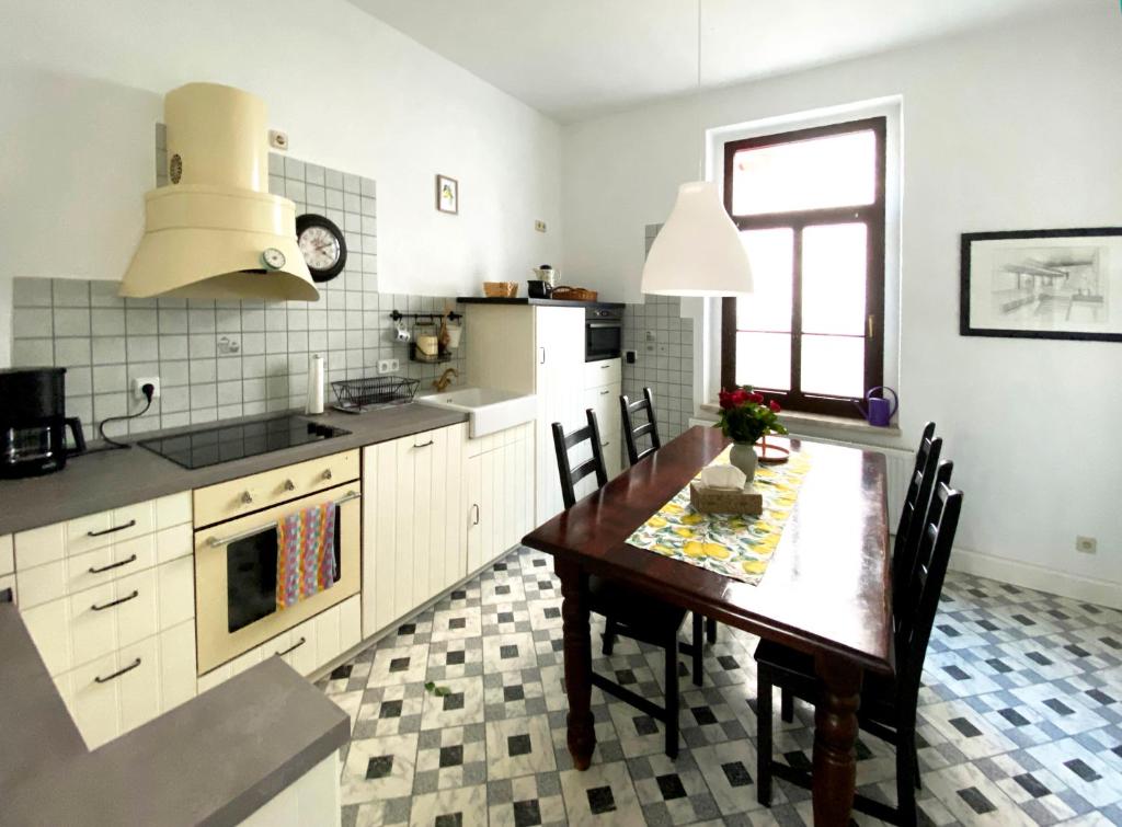 Kuchyň nebo kuchyňský kout v ubytování Zitronenhaus