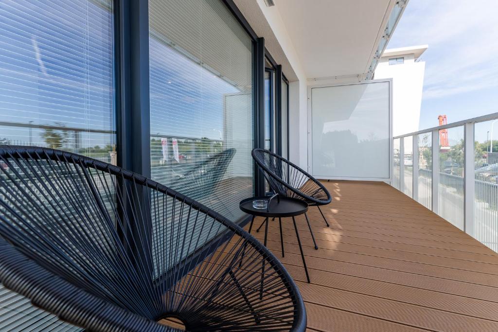 Balkón nebo terasa v ubytování Apartament Lux Tukan B004, Polanki Aqua - Holiday City