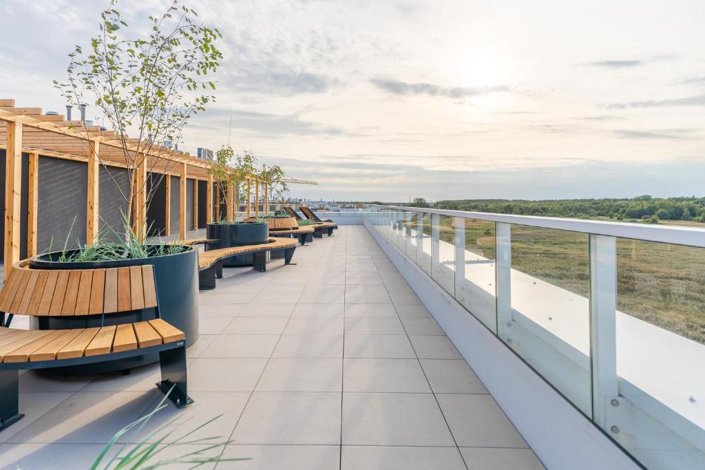 Balkón nebo terasa v ubytování Apartament Lux Tukan B004, Polanki Aqua - Holiday City