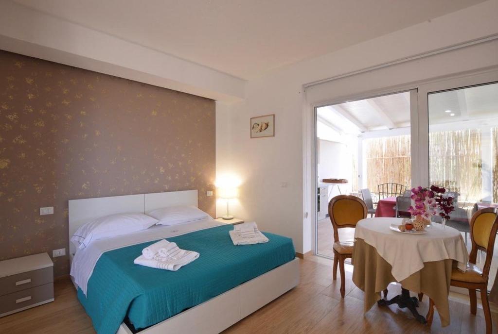 Postel nebo postele na pokoji v ubytování Saija Resort