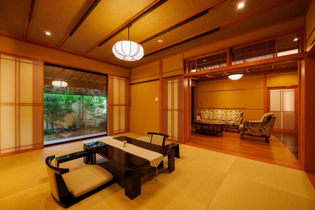 Fotografie z fotogalerie ubytování やど紫苑亭 Yado Shiontei v destinaci Jonago