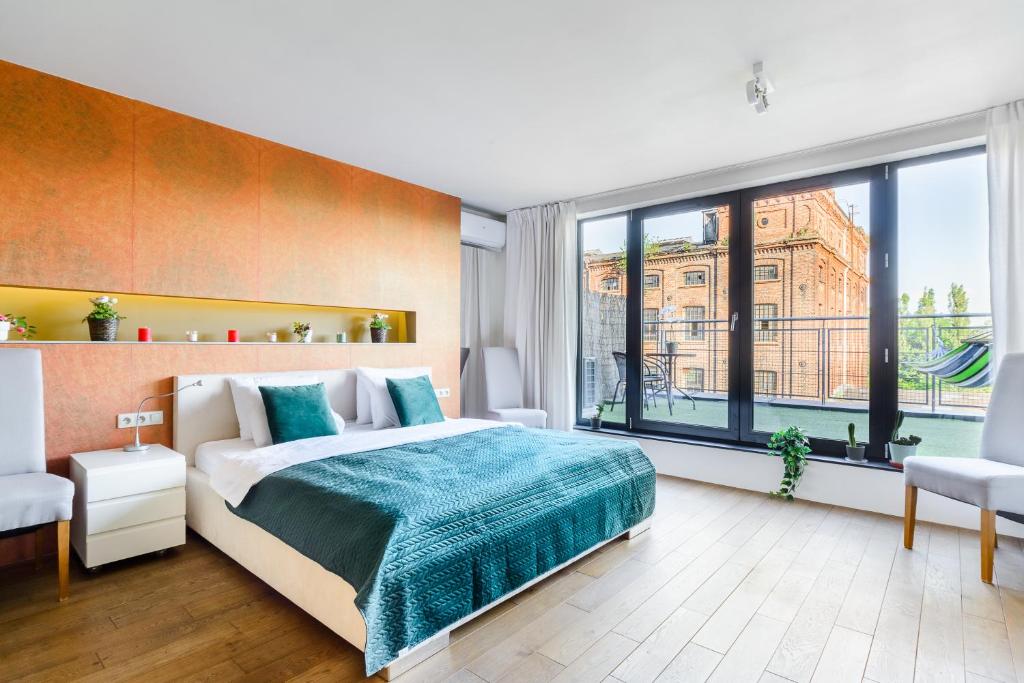 Postel nebo postele na pokoji v ubytování Lumina luxury 2-level apart near Skwer