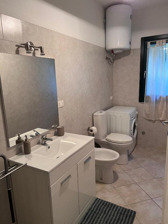 Łazienka w obiekcie Appartamento 38 - Complesso Residenziale Terme di Casteldoria
