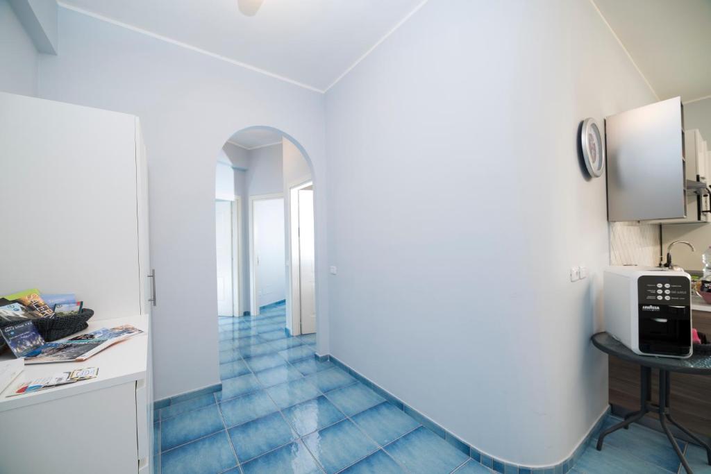 Kuchyňa alebo kuchynka v ubytovaní CAPRI B&B