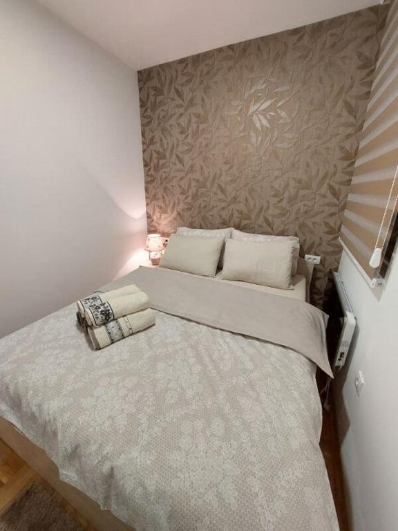 Postel nebo postele na pokoji v ubytování Apartman Loly Zlatibor