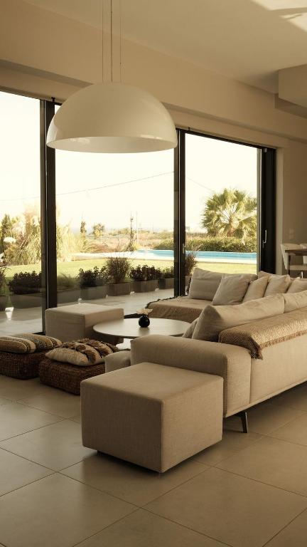 Posteľ alebo postele v izbe v ubytovaní Villa Gardenia, villa de luxe avec piscine à débordement