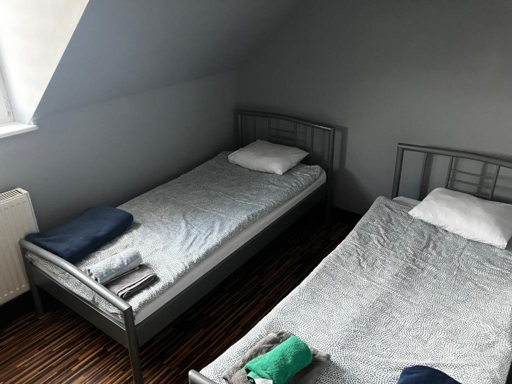 Postel nebo postele na pokoji v ubytování Wisełka