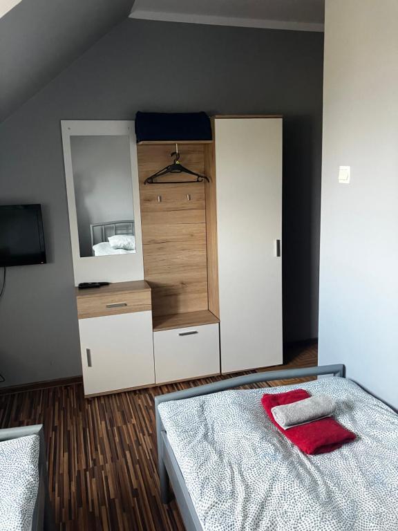 Postel nebo postele na pokoji v ubytování Wisełka