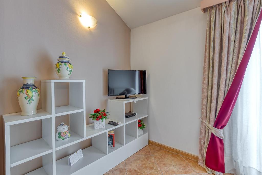 TV a/nebo společenská místnost v ubytování Apartments Slavica