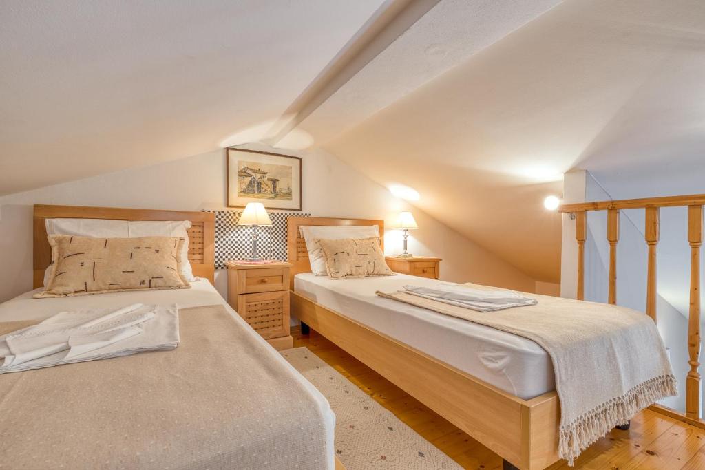 Postel nebo postele na pokoji v ubytování Apartments Slavica