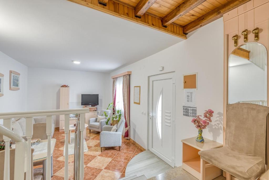 TV a/nebo společenská místnost v ubytování Apartments Slavica