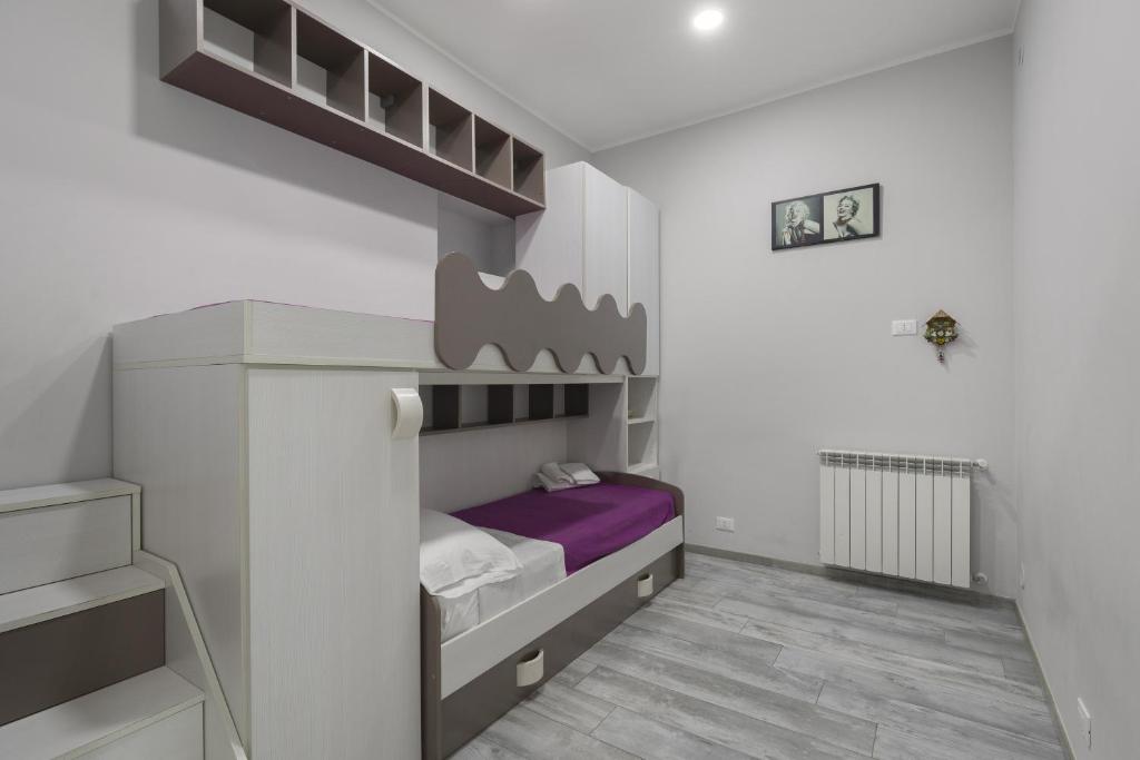 A bed or beds in a room at Casa bella