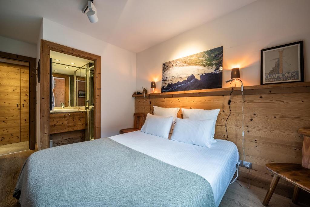 Łóżko lub łóżka w pokoju w obiekcie Apartment Valvisons Les Houches Chamonix - by EMERALD STAY