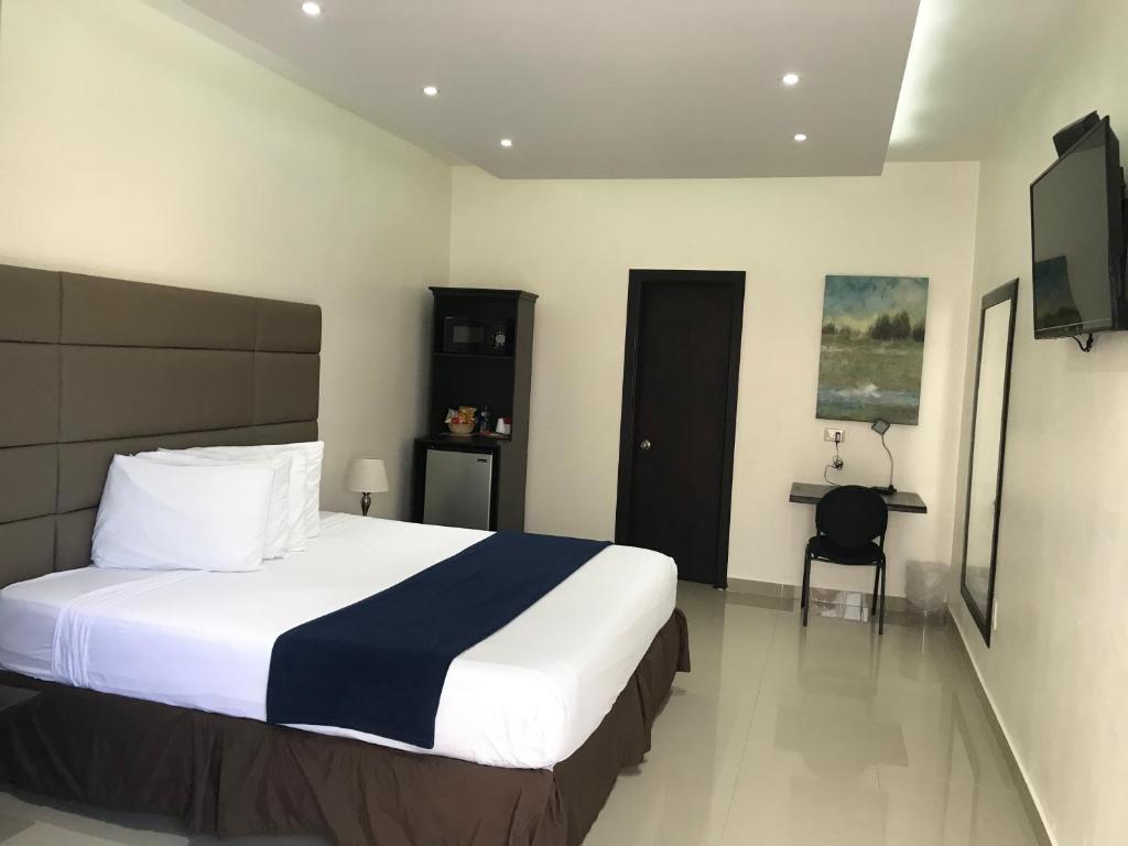 Postel nebo postele na pokoji v ubytování Starz hotel