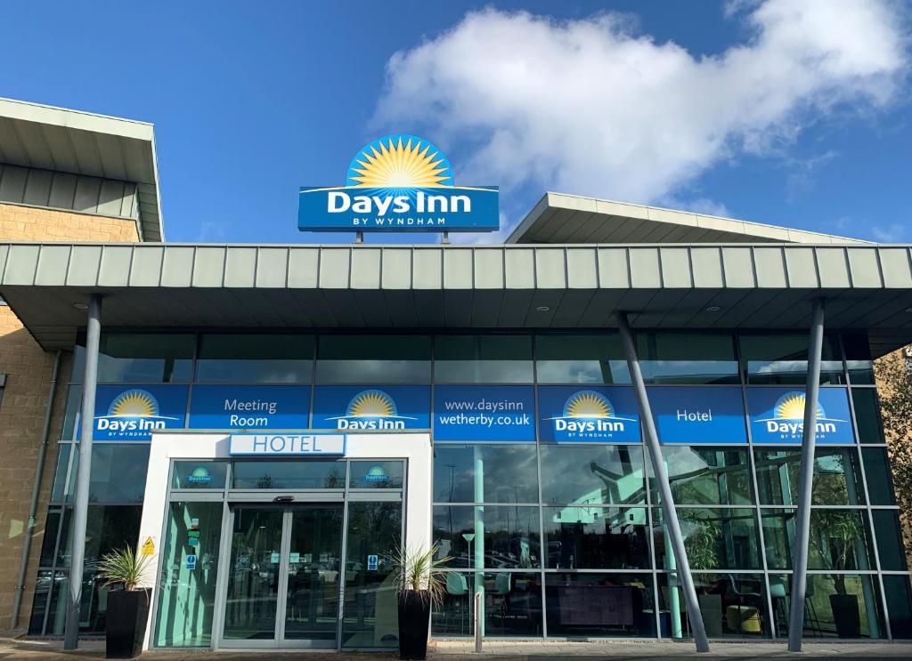 a building with a day inn sign on top of it at Days Inn Wetherby in Wetherby