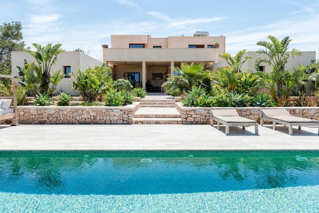 The swimming pool at or close to Lavish Ibizan Villa Beautiful Gardens Villa Izarra Private Pool Wonderful Country Views San Jose