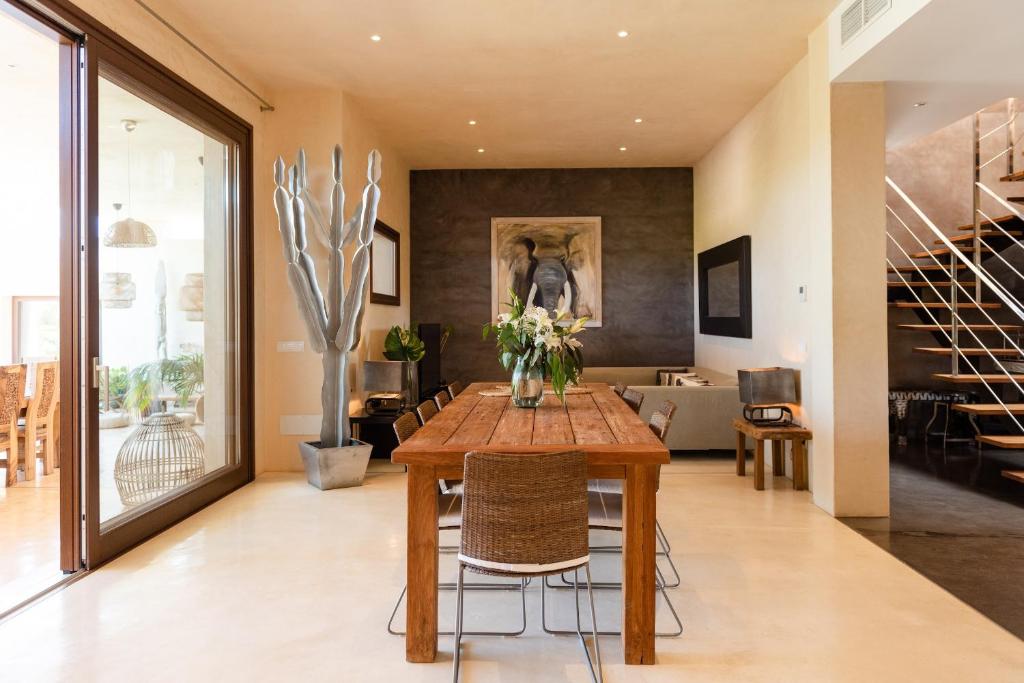 A television and/or entertainment centre at Lavish Ibizan Villa Beautiful Gardens Villa Izarra Private Pool Wonderful Country Views San Jose