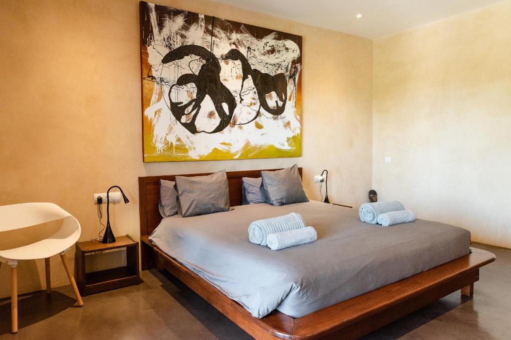 A bed or beds in a room at Lavish Ibizan Villa Beautiful Gardens Villa Izarra Private Pool Wonderful Country Views San Jose