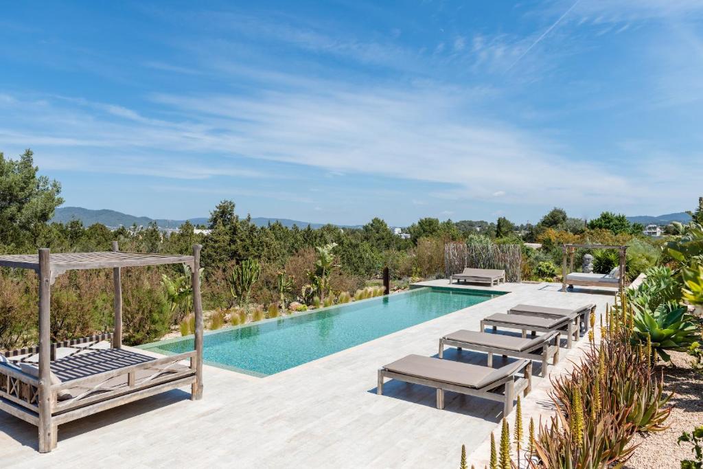 The swimming pool at or close to Lavish Ibizan Villa Beautiful Gardens Villa Izarra Private Pool Wonderful Country Views San Jose
