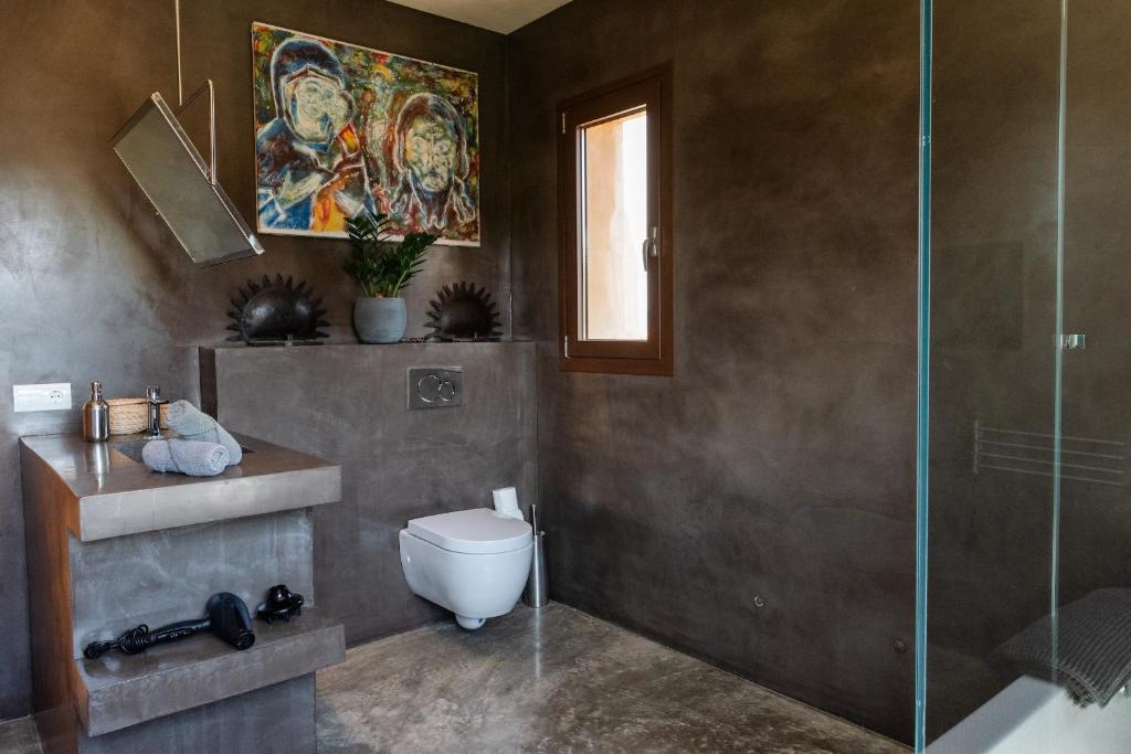 A bathroom at Lavish Ibizan Villa Beautiful Gardens Villa Izarra Private Pool Wonderful Country Views San Jose