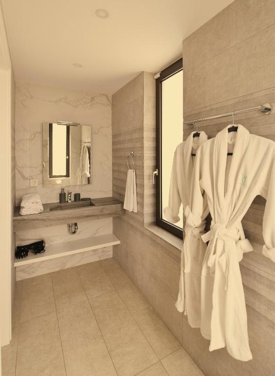 Kúpeľňa v ubytovaní Villa Gardenia, villa de luxe avec piscine à débordement