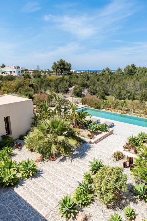 The swimming pool at or close to Lavish Ibizan Villa Beautiful Gardens Villa Izarra Private Pool Wonderful Country Views San Jose