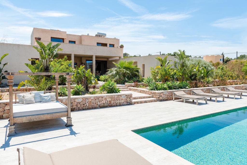 The swimming pool at or close to Lavish Ibizan Villa Beautiful Gardens Villa Izarra Private Pool Wonderful Country Views San Jose