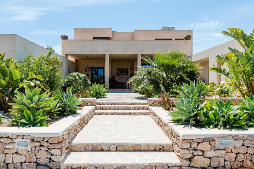 A garden outside Lavish Ibizan Villa Beautiful Gardens Villa Izarra Private Pool Wonderful Country Views San Jose