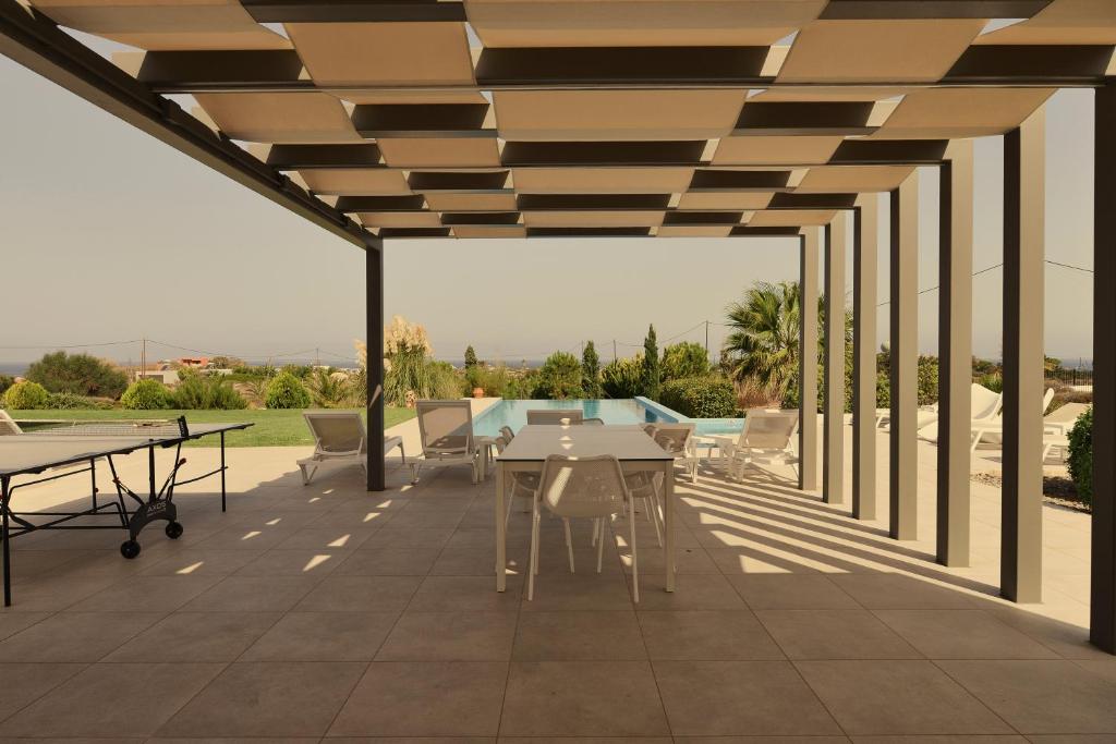 Balkón alebo terasa v ubytovaní Villa Gardenia, villa de luxe avec piscine à débordement