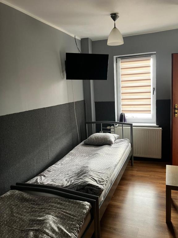 Postel nebo postele na pokoji v ubytování Wisełka