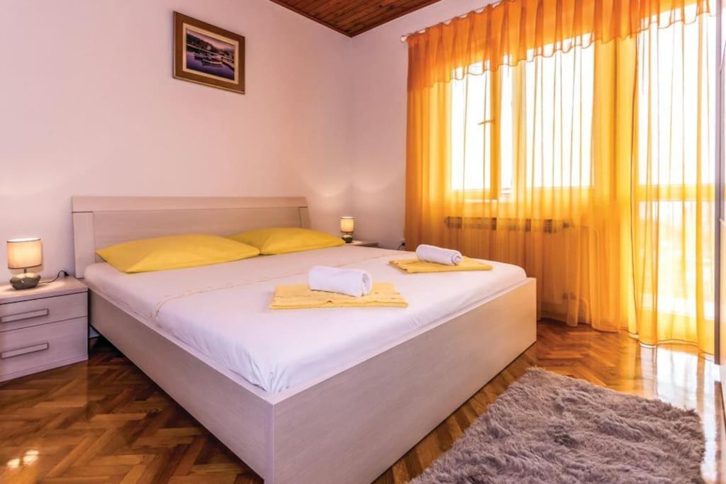 Postel nebo postele na pokoji v ubytování Apartman Toni, Gata
