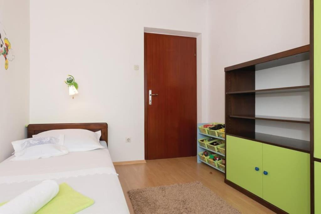 Postel nebo postele na pokoji v ubytování Apartman Toni, Gata