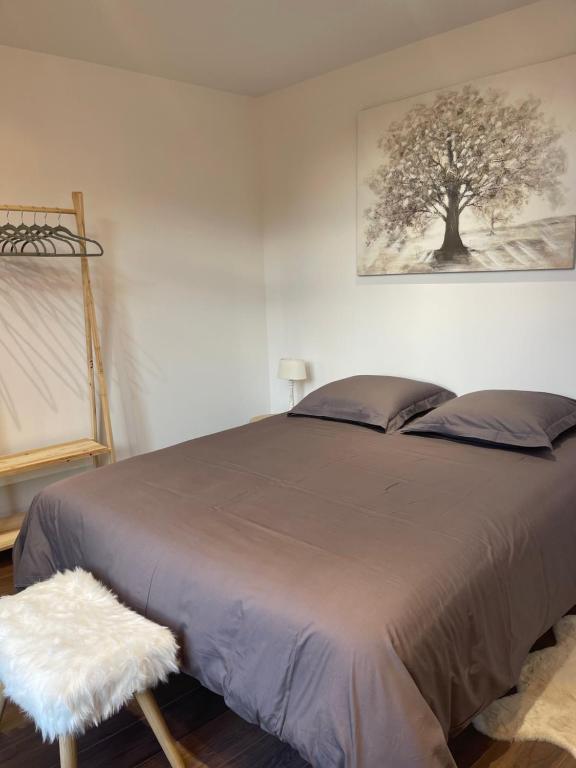 Posteľ alebo postele v izbe v ubytovaní Les Appartements du Cep’t