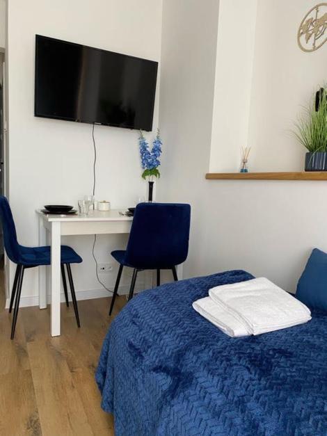 Posteľ alebo postele v izbe v ubytovaní Apartamenty nad zalewem 222