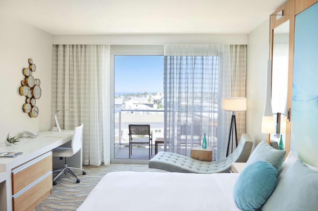 Postel nebo postele na pokoji v ubytování Paséa Hotel & Spa