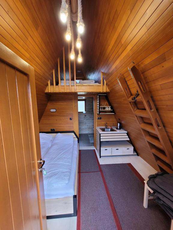 Postel nebo postele na pokoji v ubytování Koliba Umoljani
