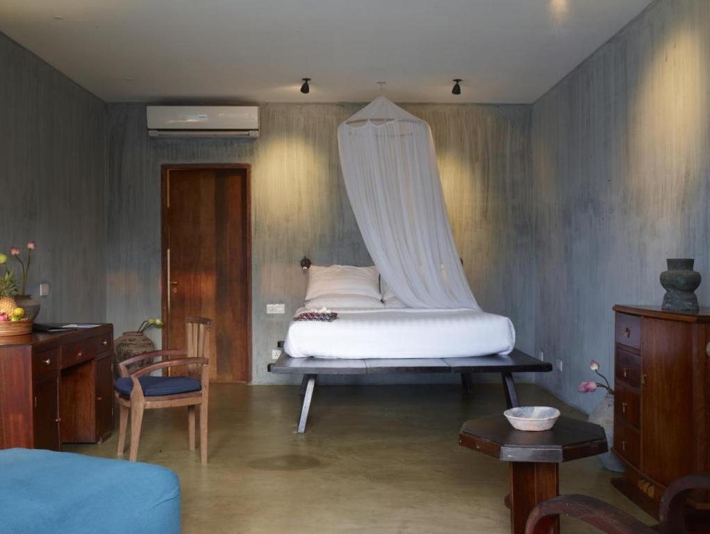 Postel nebo postele na pokoji v ubytování Knai Bang Chatt Resort