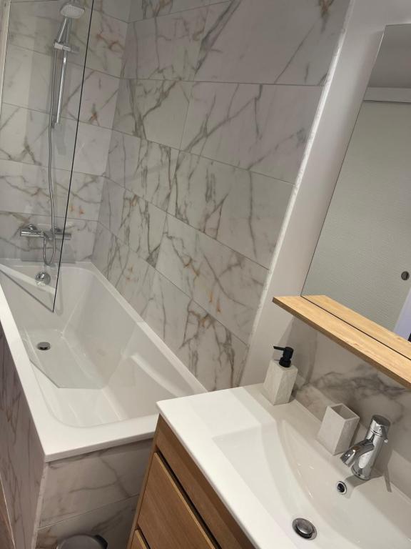 Koupelna v ubytování Les Appartements du Cep’t