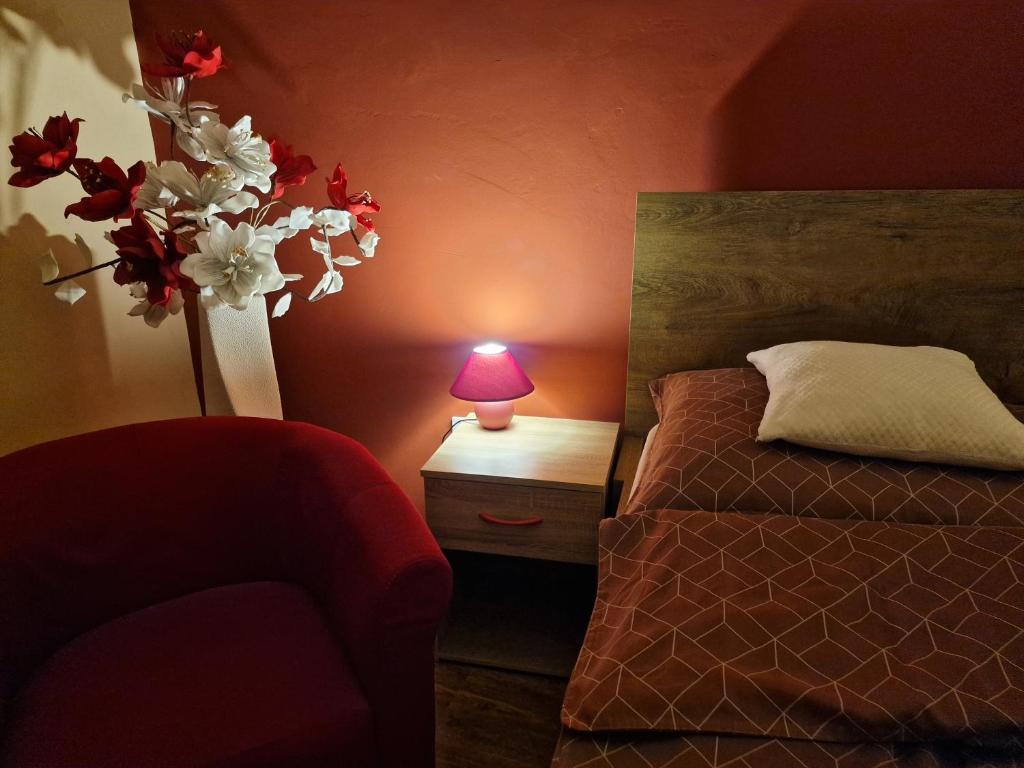 Postel nebo postele na pokoji v ubytování Mátyás Apartman