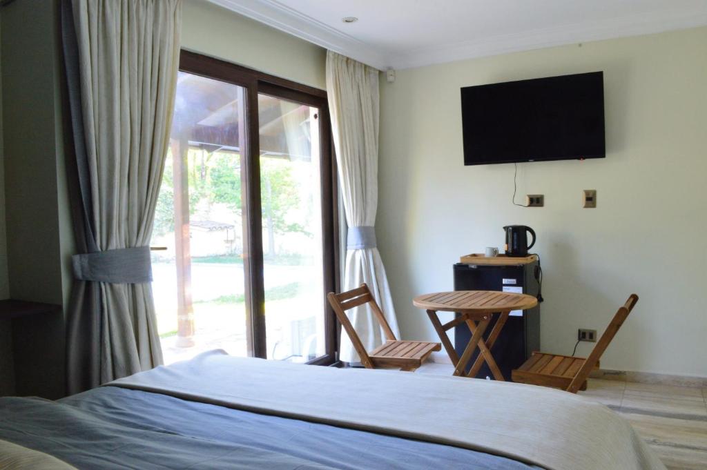 TV a/nebo společenská místnost v ubytování Olea's Home Las Condes