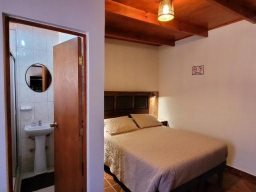 Uma cama ou camas num quarto em Lalck Cketi Hospedaje y Turismo