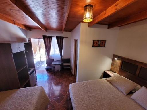 Uma cama ou camas num quarto em Lalck Cketi Hospedaje y Turismo