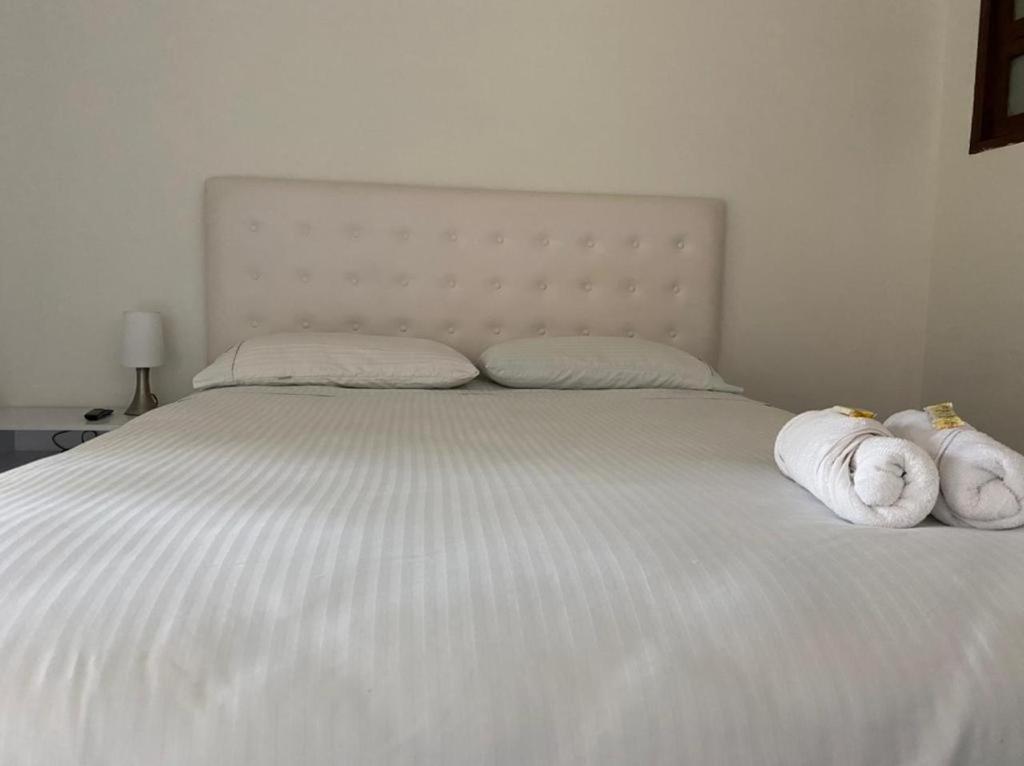Cama o camas de una habitación en Once Once Boutique